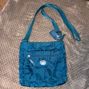 Teal Coach crossbody purse